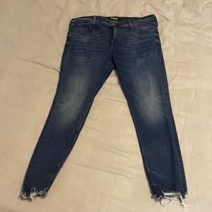 Express mid rise ankle legging size 14. Distressed at the bottom. No defects.